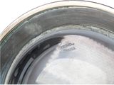 a close up of a metal bowl with a label on it