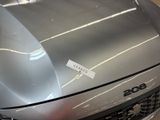 a car that has a sticker on the hood of it