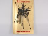 an old book with a drawing of a machine on it