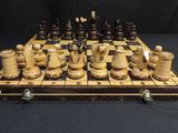 a chess board with a lot of chess pieces on it