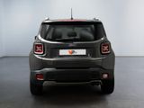 the rear end of a grey jeep compass parked in a room