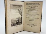 un livre ouvert sur lequel figure l'image d'un homme assis sur un banc
