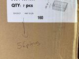 an image of a cardboard box with a sticker on it