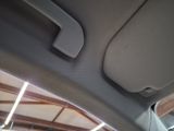 a close up of a door handle in a car