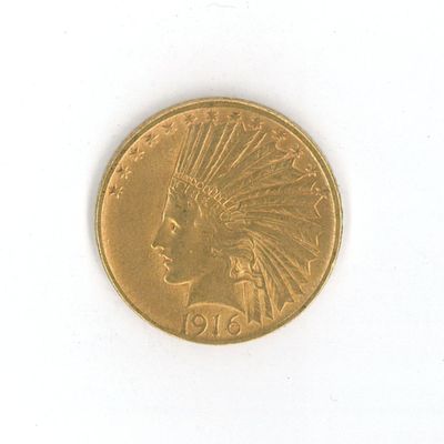 une pièce d'or sur laquelle est représentée une tête d'Indien