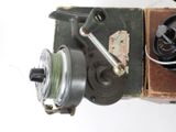 a box with a fishing line and a reel on it