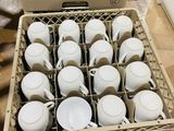a lot of cups that are sitting in a box
