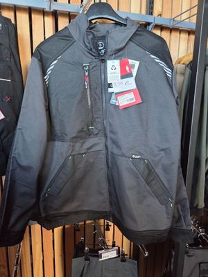 a black jacket hanging on a rack in a store