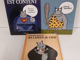 Deux livres posés sur une surface blanche : l'un représente un chat et l'autre une souris.