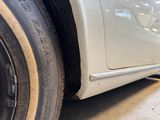 a close up of a car tire on the street