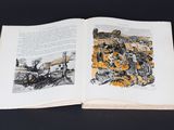 an open book with a picture of a horse drawn carriage on it
