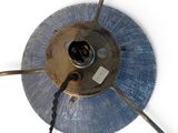 an image of a metal object with a cord attached
