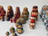 a lot of russian nesting dolls on the table