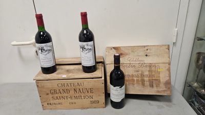 three bottles of wine sitting next to each other on a counter