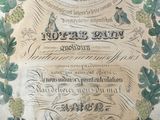 an old paper with a picture of a bird on it