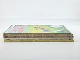 three children ' s books stacked on top of each other on a white surface