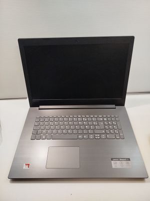 an open laptop computer sitting on top of a table next to a cup of coffee
