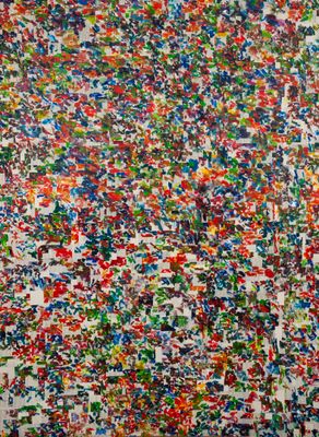painting of multicolored paint splattered on a white wall