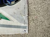 a skateboard that is sitting on top of a piece of paper