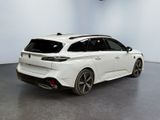 the rear end of a white car in a showroom