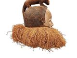 a vase that is sitting on top of a pile of straw