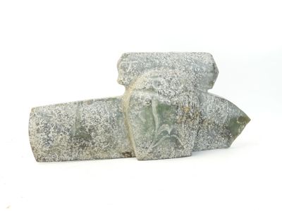 two pieces of stone sitting on top of each other