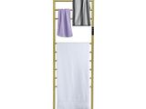 a towel rack with two towels hanging on it next to a towel rack