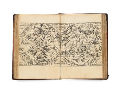 an old book with a map of the world on it