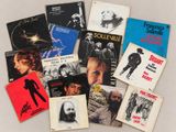 many different types of music books on the table