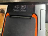 a close up of a cash mag machine on a counter