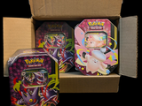 a box of pokemon cards and a tin box of tins