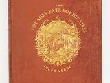 un vieux livre rouge orné d'un sceau doré sur la couverture