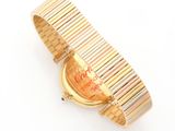 an image of a close up of a wrist watch on a white surface