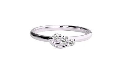 a close up of a diamond ring on a white background