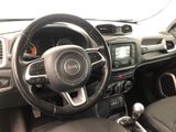 the interior of a car with a steering wheel and dashboard controls