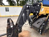 an image of a backhoe of a construction vehicle