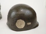 a helmet that has a hole in the middle of it