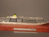 a model of a cruise ship on display on a table