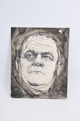 dessin d'un visage d'homme en noir et blanc sur une feuille de papier