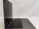 a laptop that is sitting on a white table