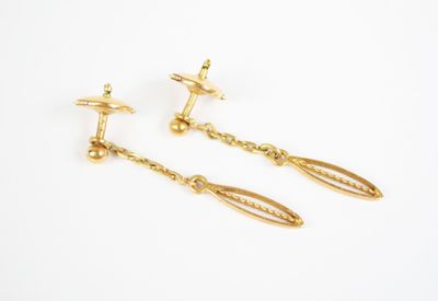 two pairs of gold earrings with dangling chains