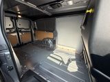 a view of the inside of a van with the door open