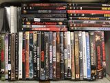 a lot of dvds in a box on the table