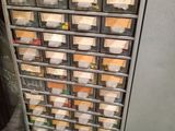a metal cabinet with many drawers and drawers on it
