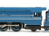 a toy train that is sitting on a white surface