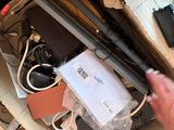 a person that is opening a box of electronics