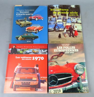 quatre livres sur la vitrine d'un concessionnaire automobile