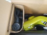 a box with a yellow corded blower and a yellow corded blower