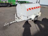 a white trailer with a red stripe on the side of it