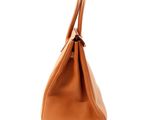 an image of a brown leather handbag on a white background